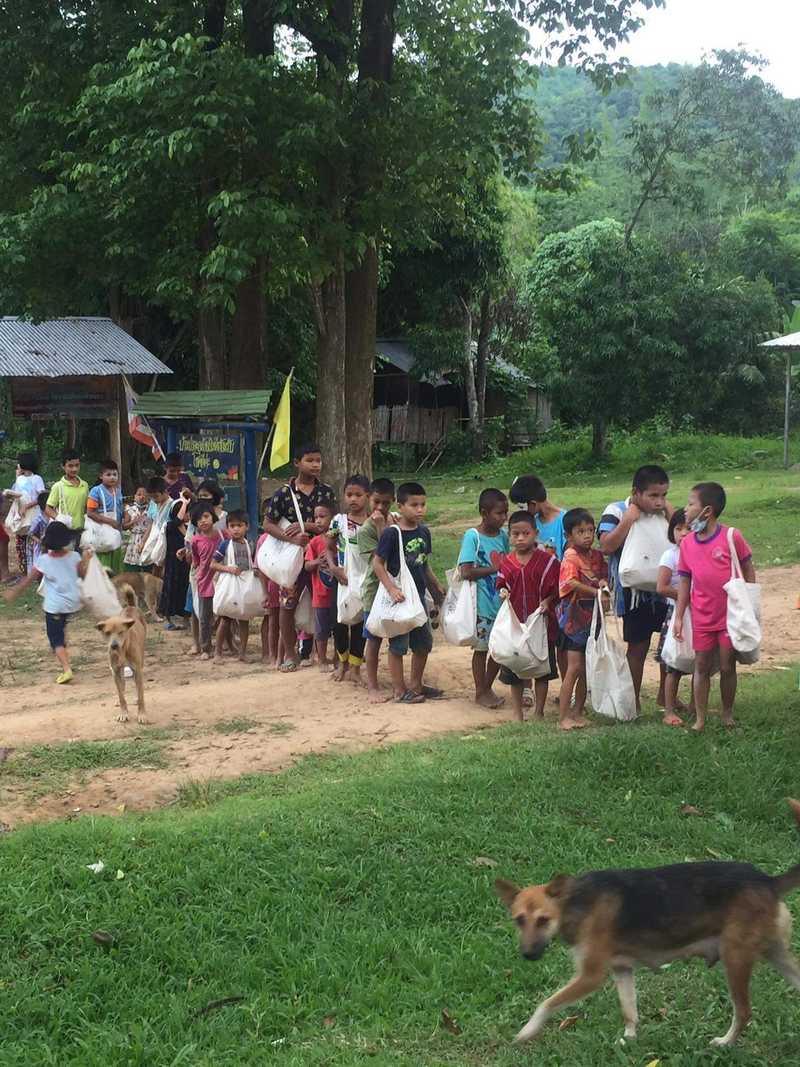 Children queuing to recive support
