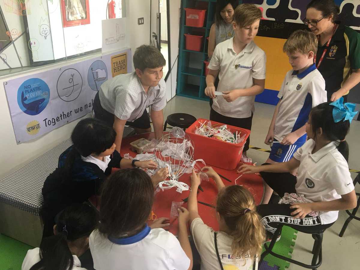 Students participating in a workshop activity